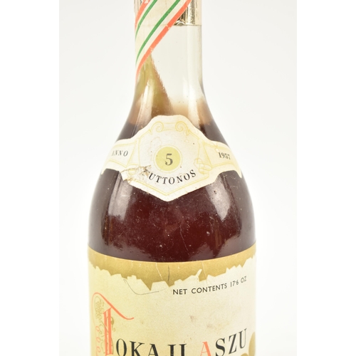 177 - An Anno 1957 Hungarian Tokaji wine 'Aszu Esszencia' bottle. Produce of Hungary. Seal appears intact.... 