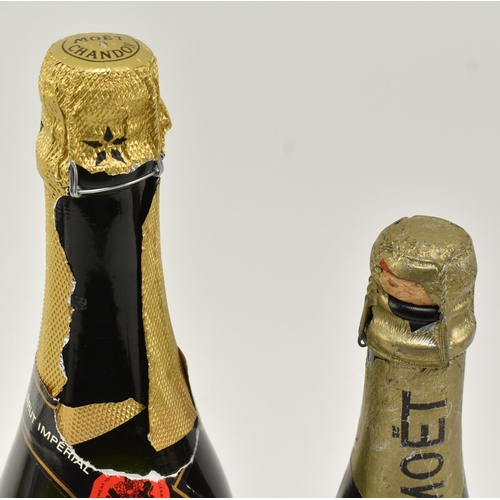 179 - Moet & Chandon Brut & Dry Imperial - Two bottles of French champagne. The lot to include a M... 