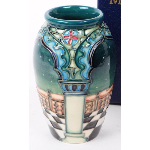 18 - William Moorcroft - Jumeirah pattern - a late 20th century ceramic vase. The vase of bulbous form, f... 