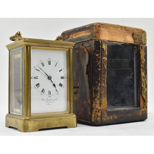 19 - Charles Frodsham & Co., Paris - a late 19th / early 20th century brass carriage clock in leather... 