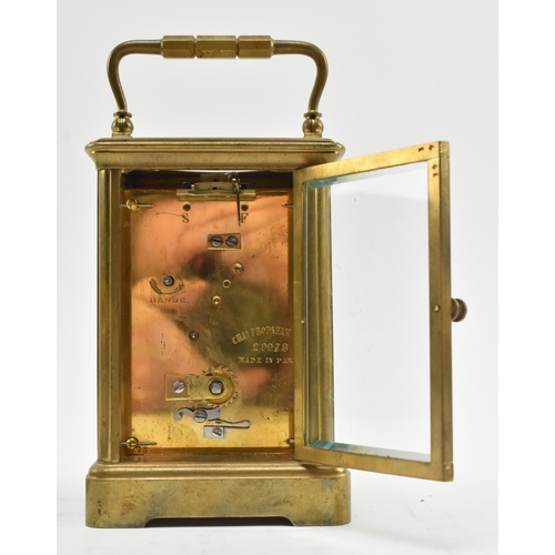 19 - Charles Frodsham & Co., Paris - a late 19th / early 20th century brass carriage clock in leather... 