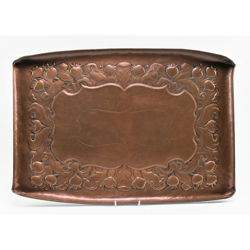 24 - Newlyn Copper - an early 20th century Arts and Crafts Cornish embossed copper 'Thistle' pattern tray... 