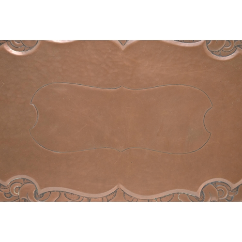 24 - Newlyn Copper - an early 20th century Arts and Crafts Cornish embossed copper 'Thistle' pattern tray... 