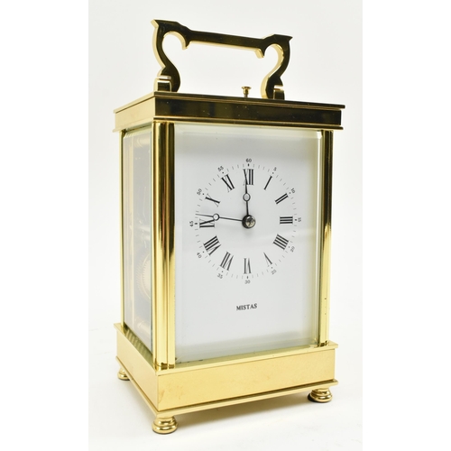 27 - A French L'Epee 20th century brass carriage repeater clock. The clock having a brass & glazed ca... 