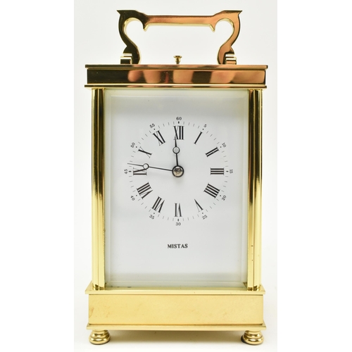 27 - A French L'Epee 20th century brass carriage repeater clock. The clock having a brass & glazed ca... 