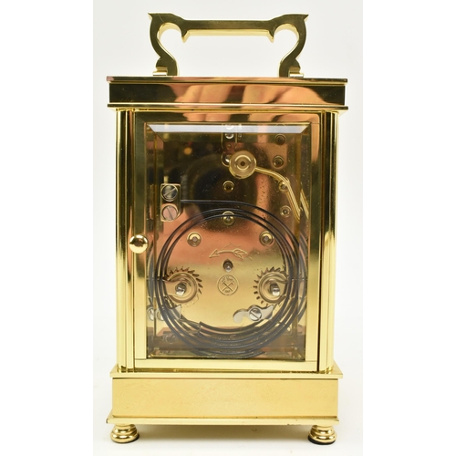 27 - A French L'Epee 20th century brass carriage repeater clock. The clock having a brass & glazed ca... 