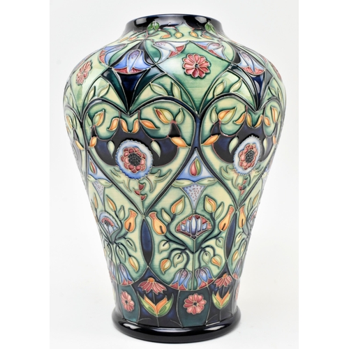 28 - Rachel Bishop for Moorcroft Pottery - Anatolia Pattern - a 2003 tube lined ceramic baluster shaped C... 