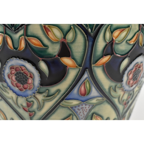 28 - Rachel Bishop for Moorcroft Pottery - Anatolia Pattern - a 2003 tube lined ceramic baluster shaped C... 