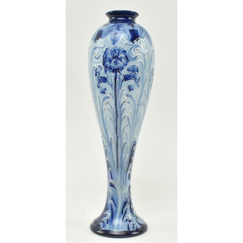 3 - William Moorcroft (1872-1945) for MacIntyre & Co - a late 19th century Florian Ware tube lined g... 