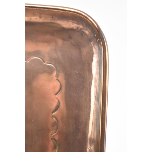 32 - Newlyn Copper - an early 20th century embossed Cornish copper tray. The tray of rectangular form wit... 