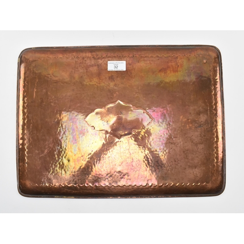 32 - Newlyn Copper - an early 20th century embossed Cornish copper tray. The tray of rectangular form wit... 