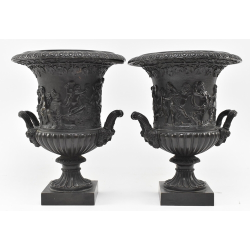 41 - A pair of Grand Tour Victorian 19th century Medici bronze urns. Each having a flared gadrooned rim o... 