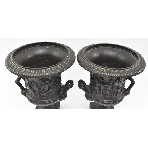 41 - A pair of Grand Tour Victorian 19th century Medici bronze urns. Each having a flared gadrooned rim o... 