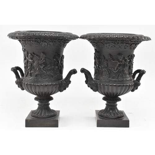 41 - A pair of Grand Tour Victorian 19th century Medici bronze urns. Each having a flared gadrooned rim o... 