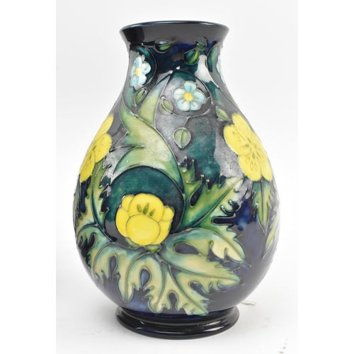 43 - Sally Tuffin for Moorcroft Pottery - Buttercup Pattern - a late 20th century 1991 tube lined ceramic... 