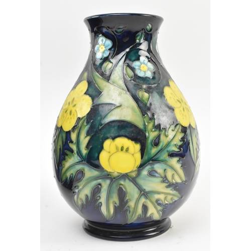 43 - Sally Tuffin for Moorcroft Pottery - Buttercup Pattern - a late 20th century 1991 tube lined ceramic... 