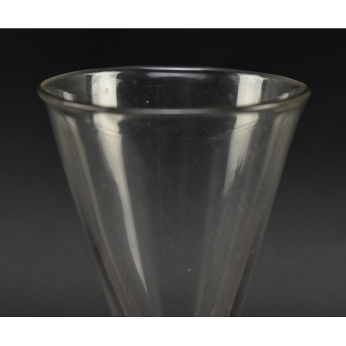 44 - A mid 18th century George II circa 1760 wine glass. The glass featuring funnel bowl over double opaq... 