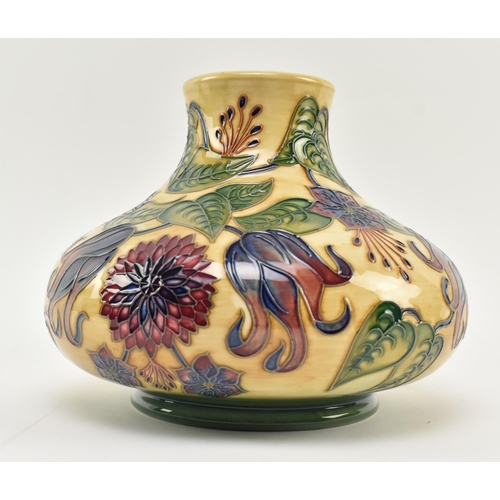 48 - William Moorcroft - Tahiti pattern - a late 20th century ceramic squat vase, with a cream, green and... 