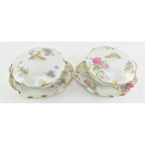 56 - Limoges, France - a pair of early 20th century French porcelain twin handled lidded dishes with stan... 