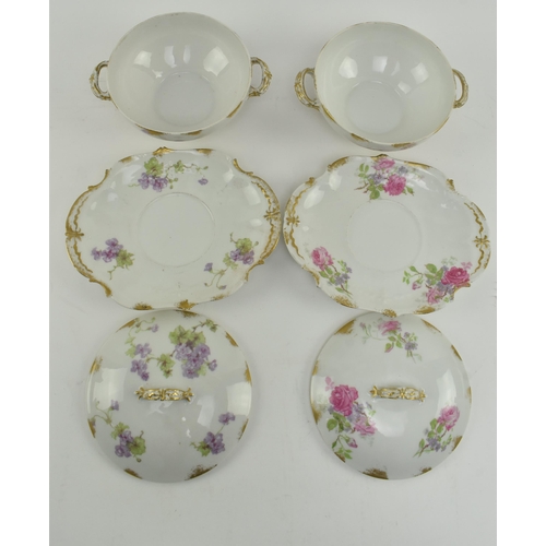 56 - Limoges, France - a pair of early 20th century French porcelain twin handled lidded dishes with stan... 