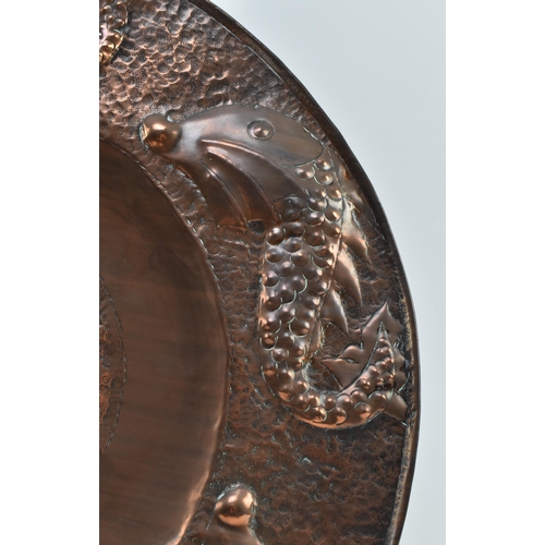 57 - Attributed to Charles Thomas Eustace (British, 1876-1957) - An Arts and Crafts Cornish copper repous... 