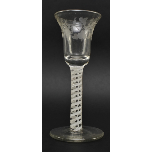 60 - A mid 18th century George II circa 1760 wine glass. The glass with bell shaped bowl featuring vine &... 