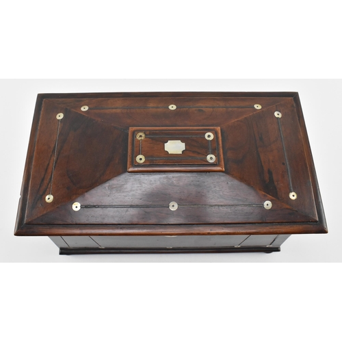 61 - An early 19th century rosewood and ebony strung inlaid tea caddy with mother of pearl detailing. The... 