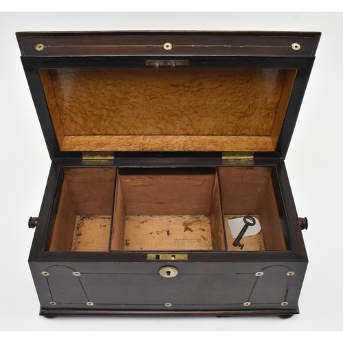 61 - An early 19th century rosewood and ebony strung inlaid tea caddy with mother of pearl detailing. The... 