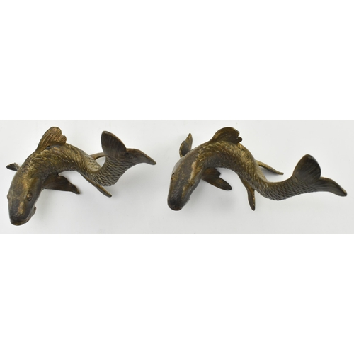 63 - A pair of 19th century lost wax bronze decorative fish figures / paperweights. Each depicting a fish... 