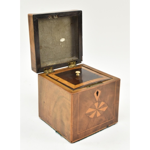 65 - An early 19th century Regency style marquetry inlaid small tea caddy. The caddy featuring Masonic sy... 