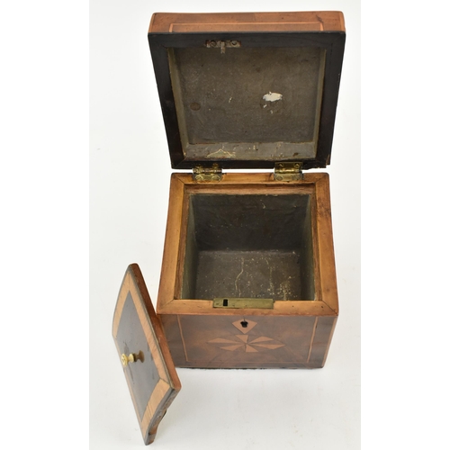 65 - An early 19th century Regency style marquetry inlaid small tea caddy. The caddy featuring Masonic sy... 