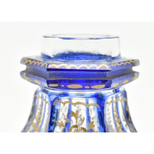 71 - A late 19th century Bohemian flash cut cobalt and gilded ink well. The ink well with hexagonal lid w... 