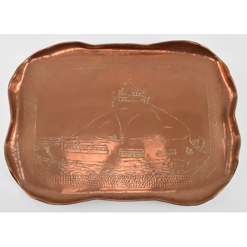 77 - Charles Thomas Eustace (British, 1876-1957) - An early 20th century Hayle hand embossed copper tray.... 