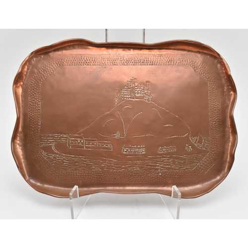 77 - Charles Thomas Eustace (British, 1876-1957) - An early 20th century Hayle hand embossed copper tray.... 