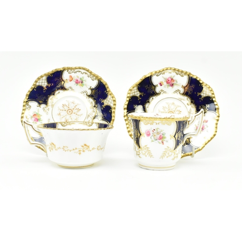 79 - Coalport - an early 20th century cobalt and gilt porcelain china part tea service. Each item decorat... 