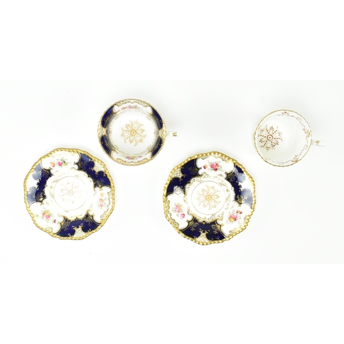 79 - Coalport - an early 20th century cobalt and gilt porcelain china part tea service. Each item decorat... 