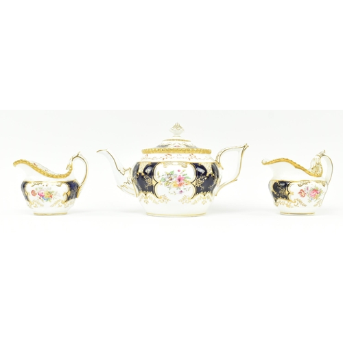 79 - Coalport - an early 20th century cobalt and gilt porcelain china part tea service. Each item decorat... 