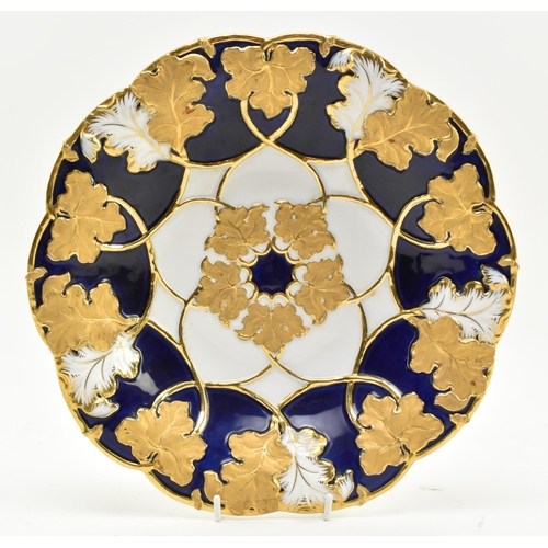 8 - A 19th century Meissen gilt & cobalt blue painted porcelain plate. The plate having a ribboned e... 