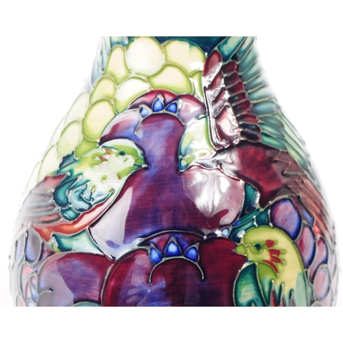 81 - William Moorcroft - Finches and Fruit pattern - a late 20th century ceramic vase designed by Sally T... 