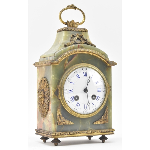 88 - A French continental early 20th century green onyx & brass mounted 8-day mantle clock. The clock... 