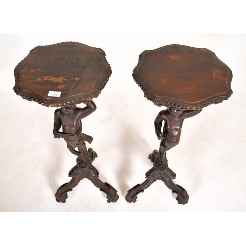 190 - A pair of Italian late 19th century ebonised wood decorative blackamoor torchere plant stands. Each ... 