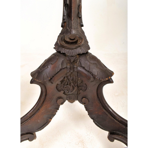 190 - A pair of Italian late 19th century ebonised wood decorative blackamoor torchere plant stands. Each ... 