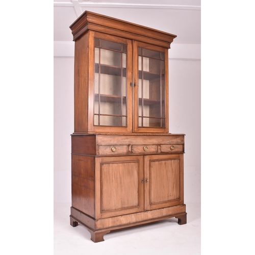 191 - A George III early 19th century mahogany astragal glazed library bookcase cabinet. The bookcase havi... 