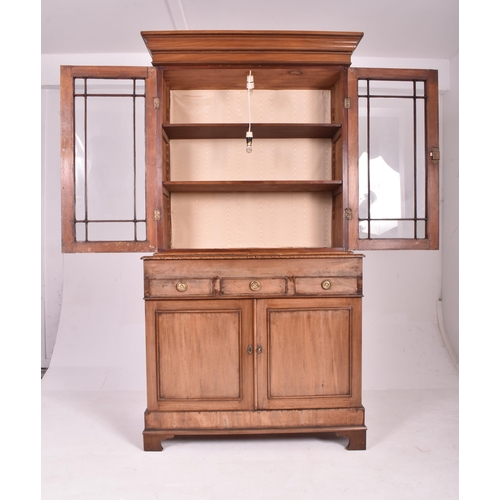 191 - A George III early 19th century mahogany astragal glazed library bookcase cabinet. The bookcase havi... 