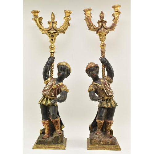 194 - A pair of 19th century Victorian hand carved & gilded Blackamoor figurines, each figured holding... 