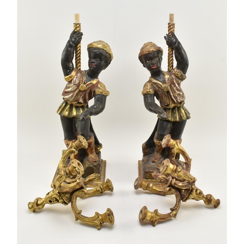 194 - A pair of 19th century Victorian hand carved & gilded Blackamoor figurines, each figured holding... 