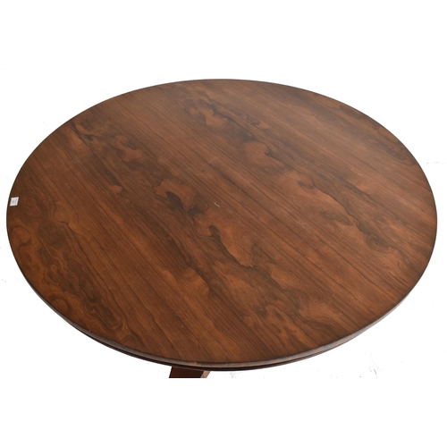 196 - A William IV 19th century rosewood tilt top breakfast loo table. The table having a circular top wit... 