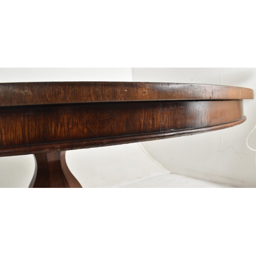 196 - A William IV 19th century rosewood tilt top breakfast loo table. The table having a circular top wit... 