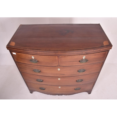 199 - A George III 19th century mahogany inlaid bow front chest of drawers. The chest having a caddy top o... 