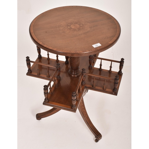 202 - An Edwardian mahogany inlaid revolving book reading table. The table having a circular inlaid top wi... 